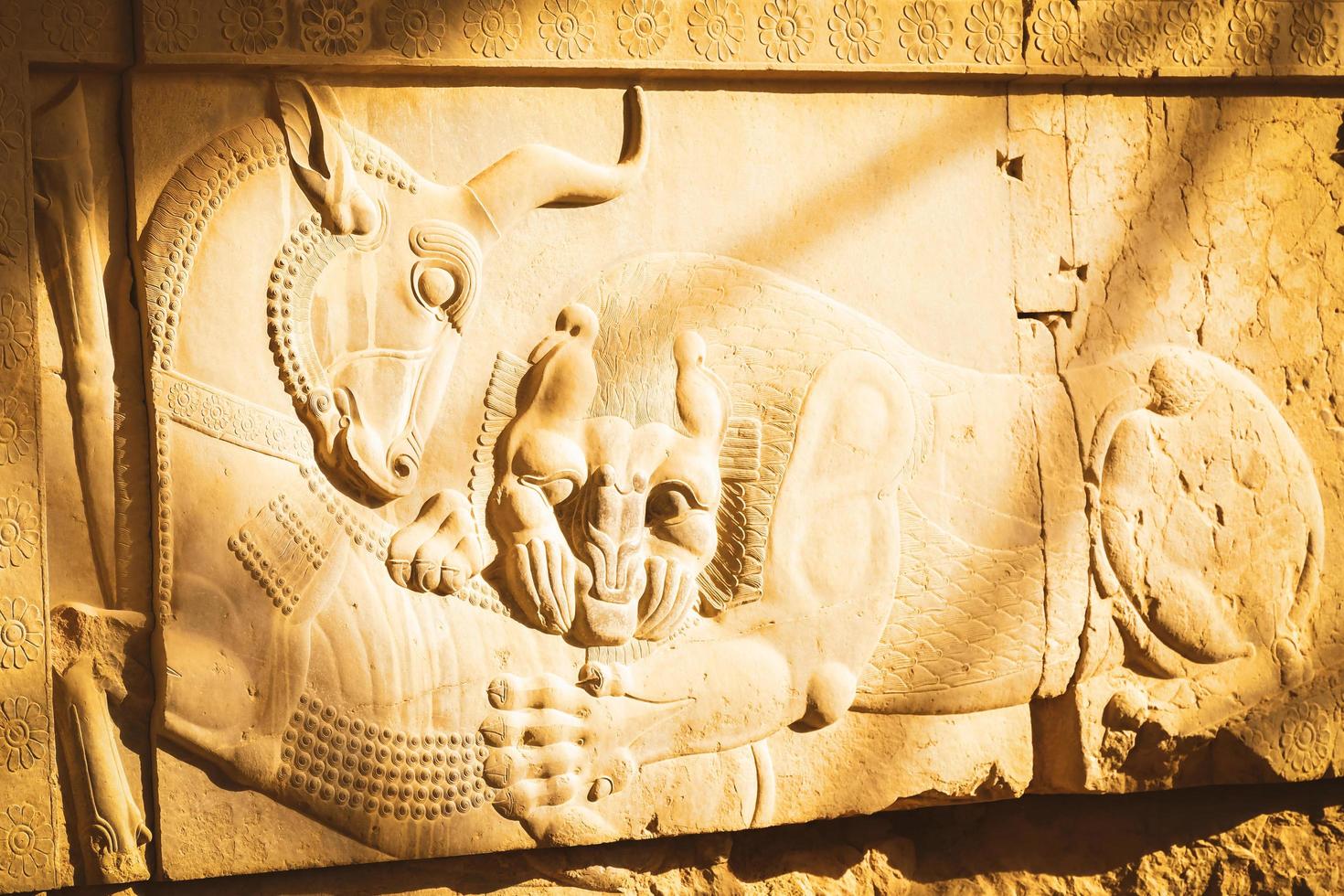 Persepolis, Iran - 8th june, 2022 - The ancient tombs of Achaemenid dynasty Kings of Persia are carved in rocky cliff in Naqsh-e Rustam, Iran photo