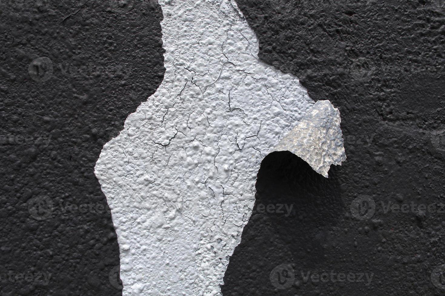 old peeling paint grunge peeled damaged concrete wall black and white texture photo