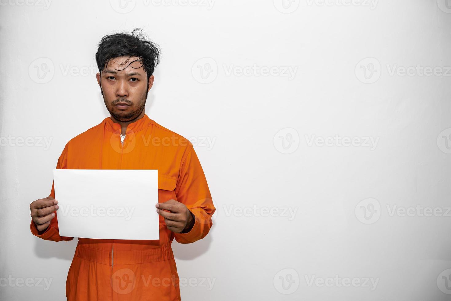 Portrait of prisoner on white background,Asian bad guy,The criminal was arrested by the police. photo