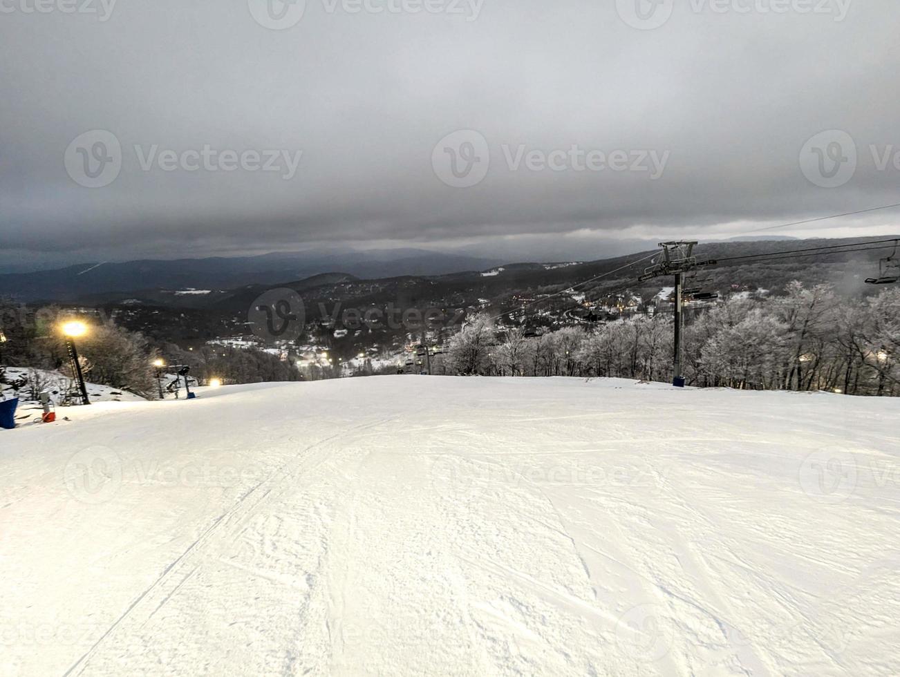 snowy cloudy day at beech mountain ski resort in NC photo