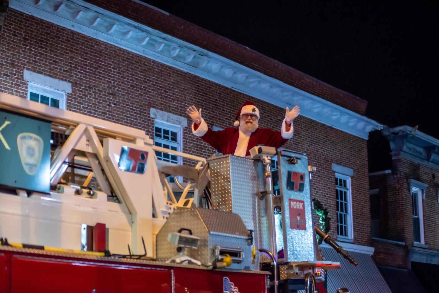 Small town Christmas parade street scenes photo