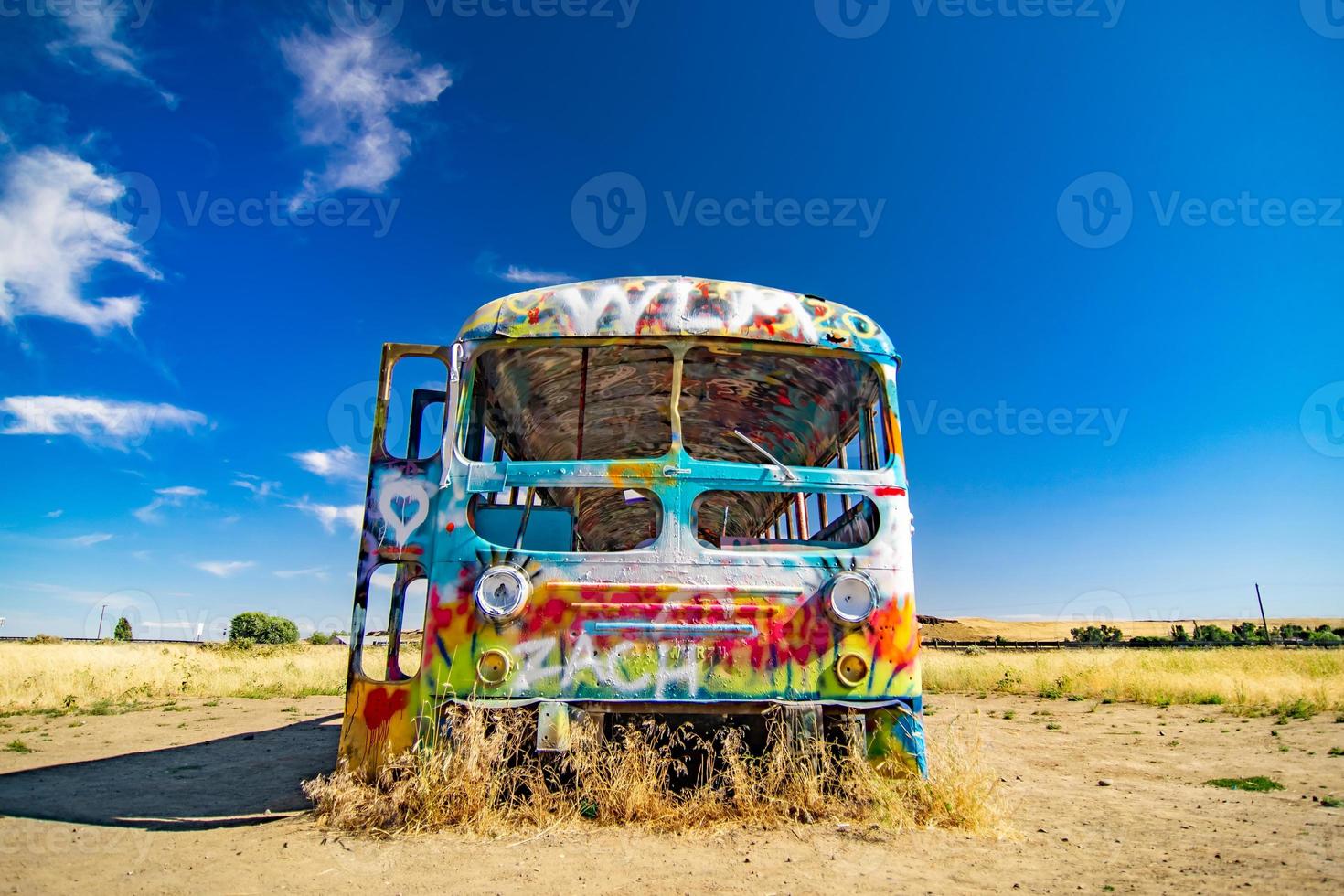 colorful graffiti on school bus in palouse washington photo