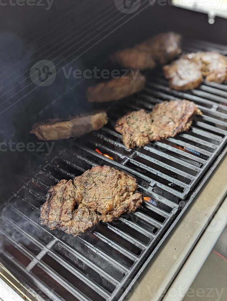 grilled steak medium rare for family dinner photo