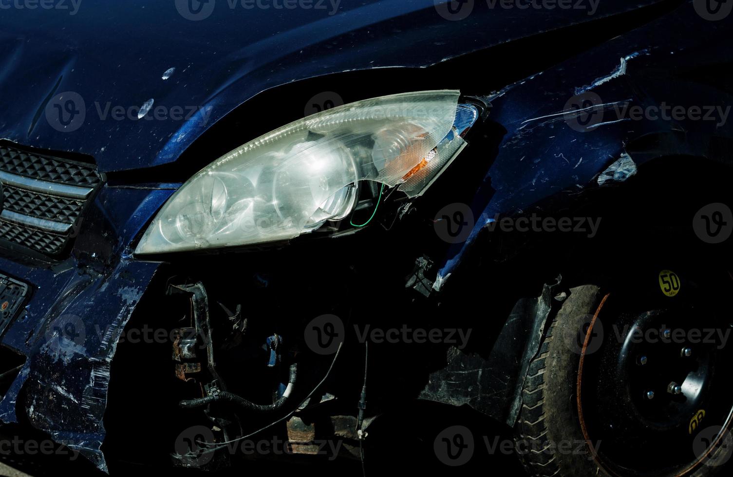 Broken car headlight photo