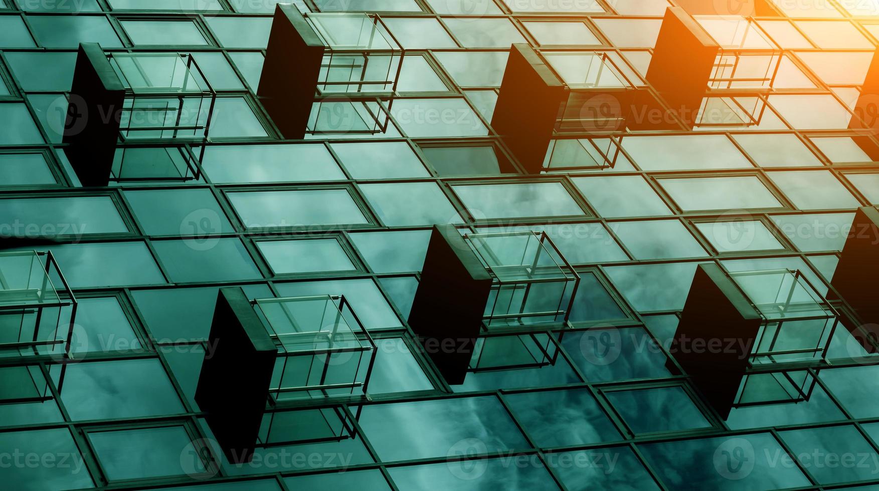 facade of a glass hotel building photo