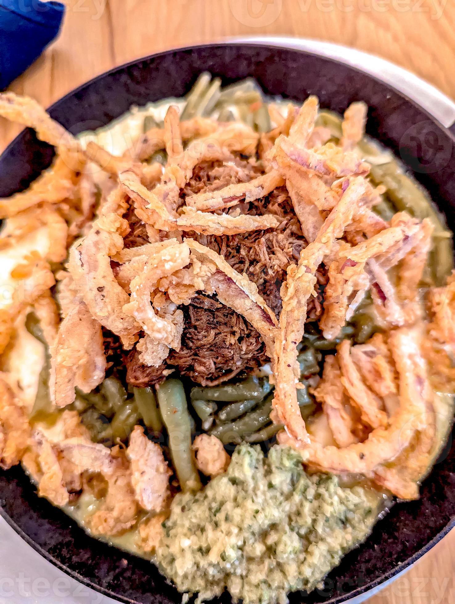 beef and grits on dinner table 21450539 Stock Photo at Vecteezy