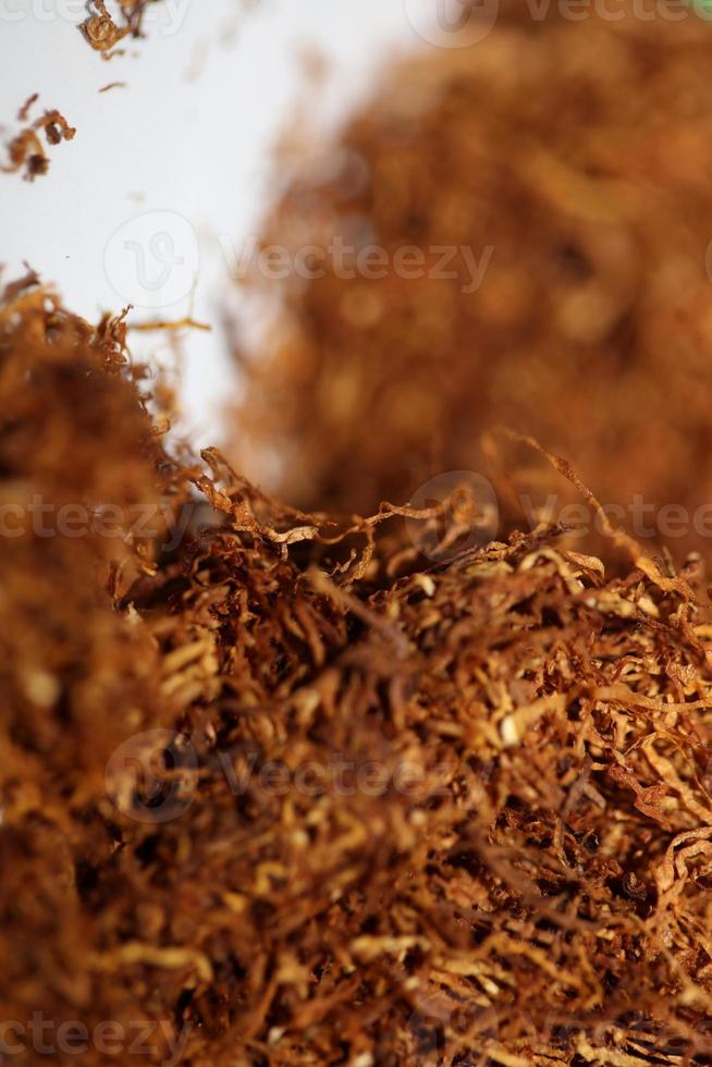 Rolling tobacco close up background big size high quality stock photos smoking self made cigarettes and joint