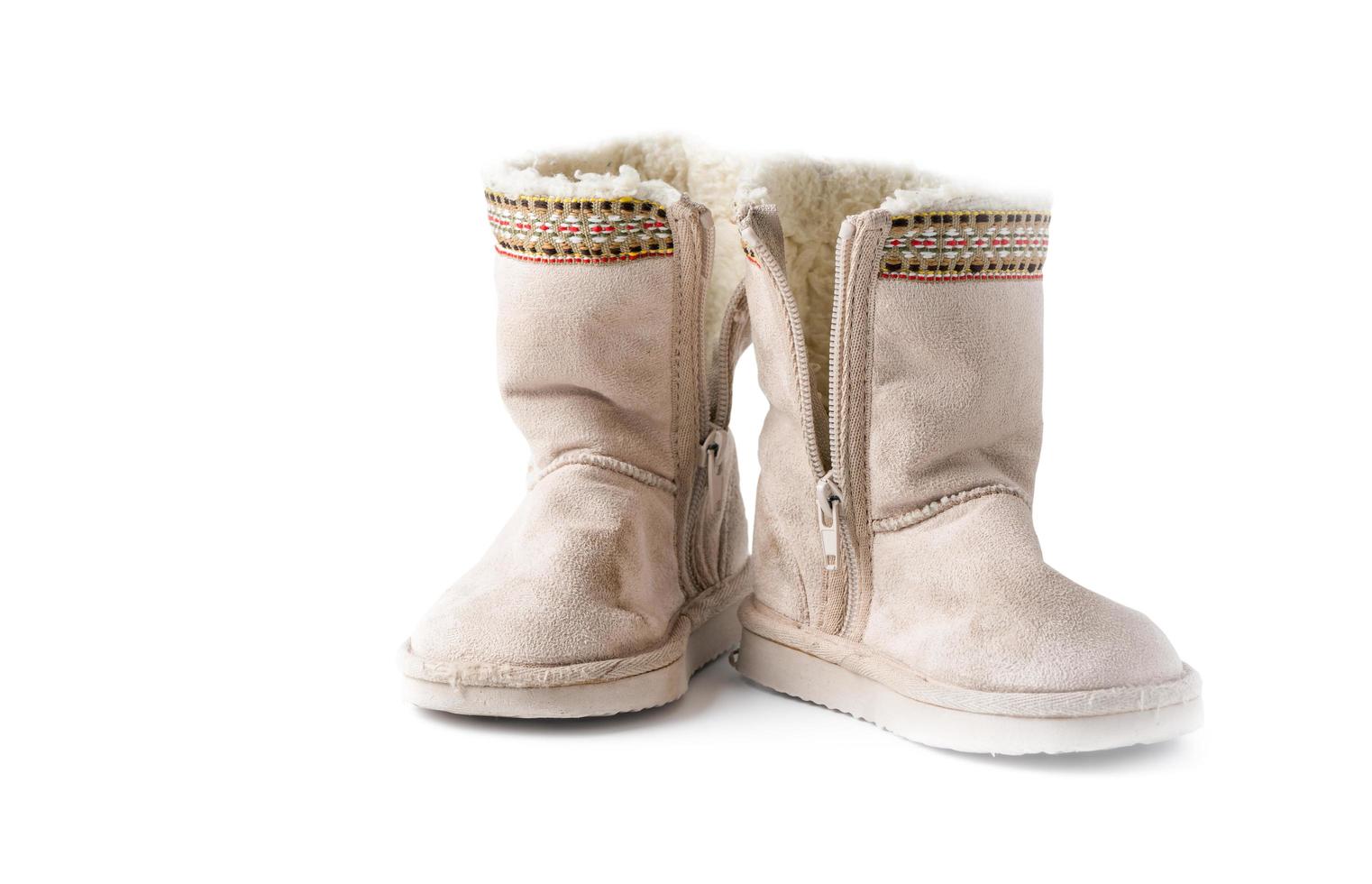 Kids warm winter boots with fur isolated photo