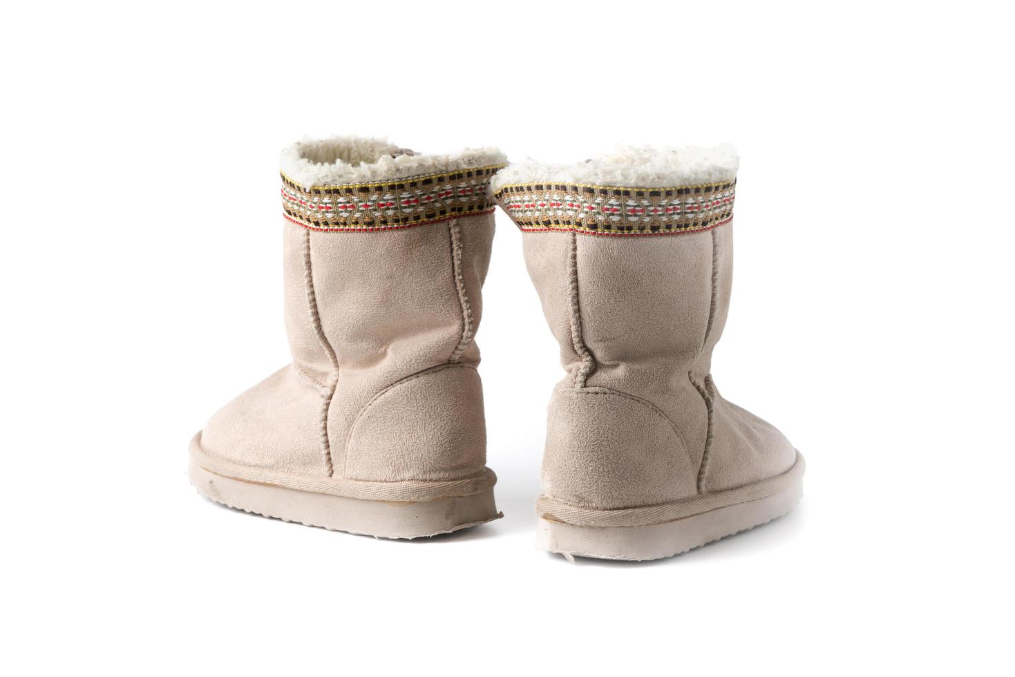 Kids warm winter boots with fur isolated photo