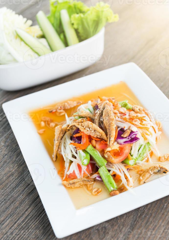 papaya salad with crispy fish photo