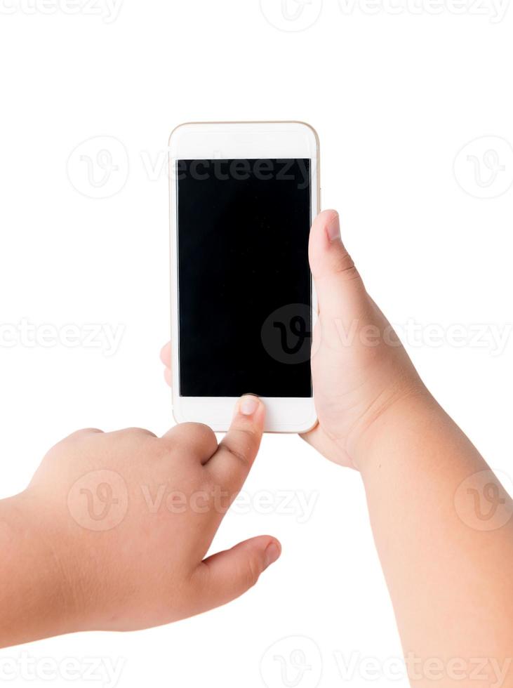 kid hand touch on mobile smart phone with blank screen. photo