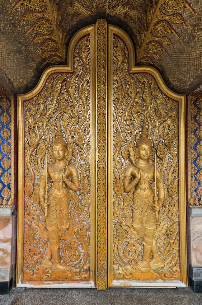 Pattern of the entrance to the Castle Gold and located inside Tha sung temple Uthai Thani, on August 12, 2016 in Uthai Thani, Thailand. photo