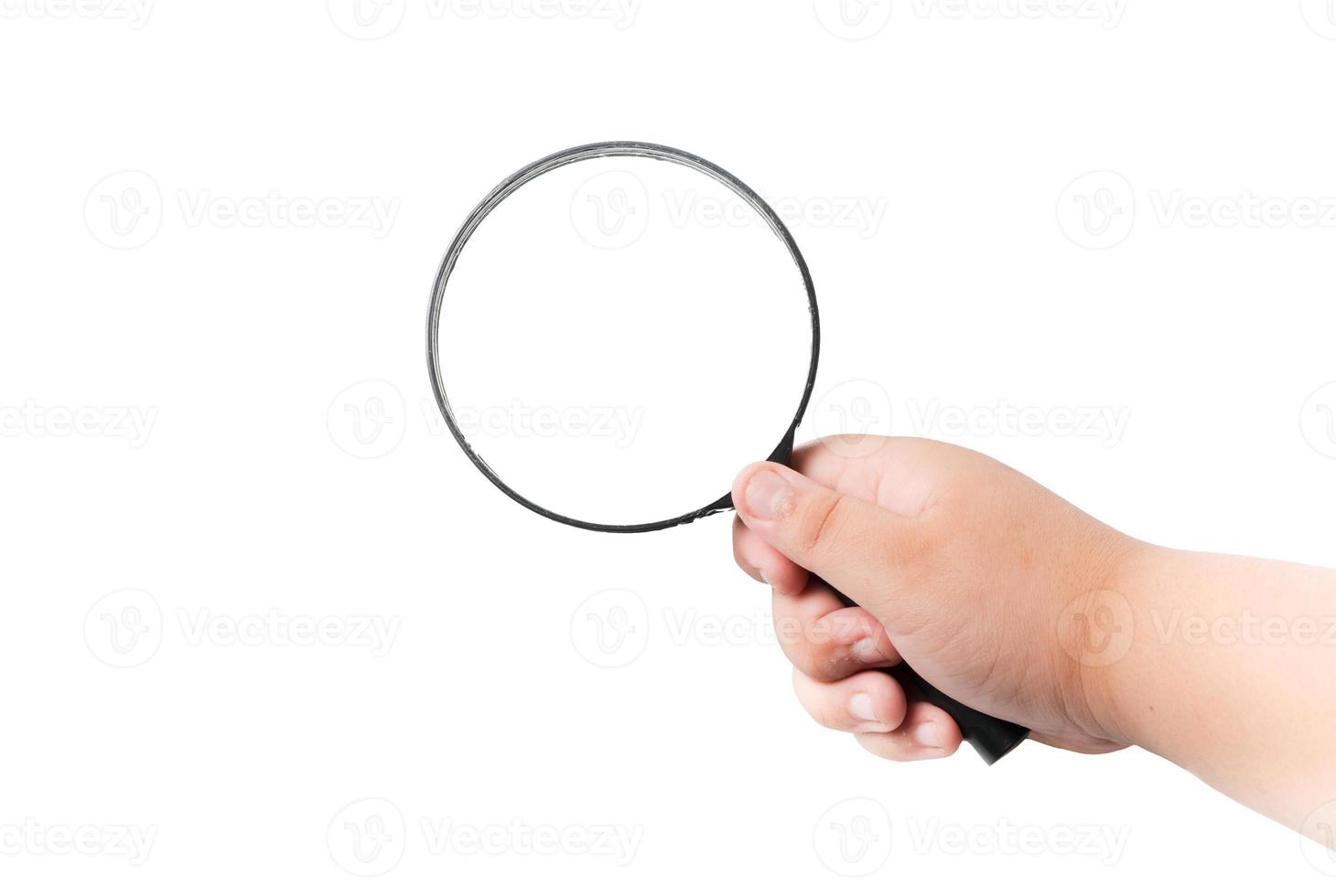 Magnifier in hand isolated photo