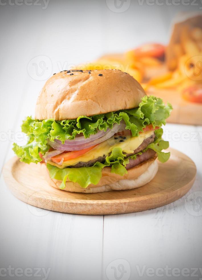 Homemade hamburger in wood plate photo