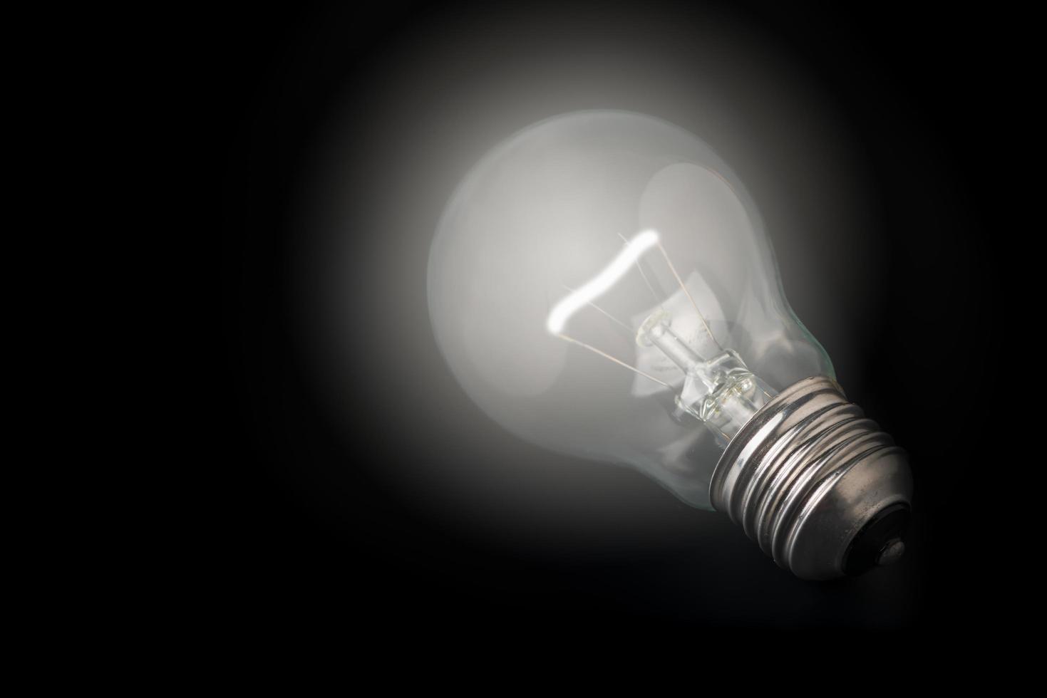 bulb light on black  background photo