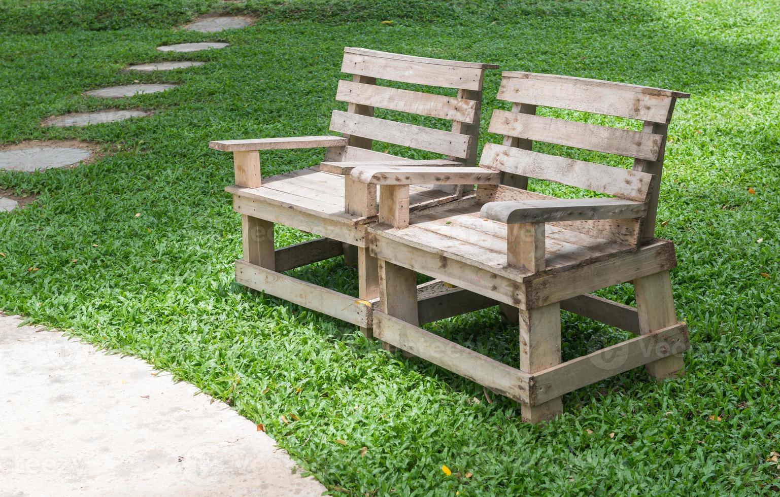 old wood chair in park photo