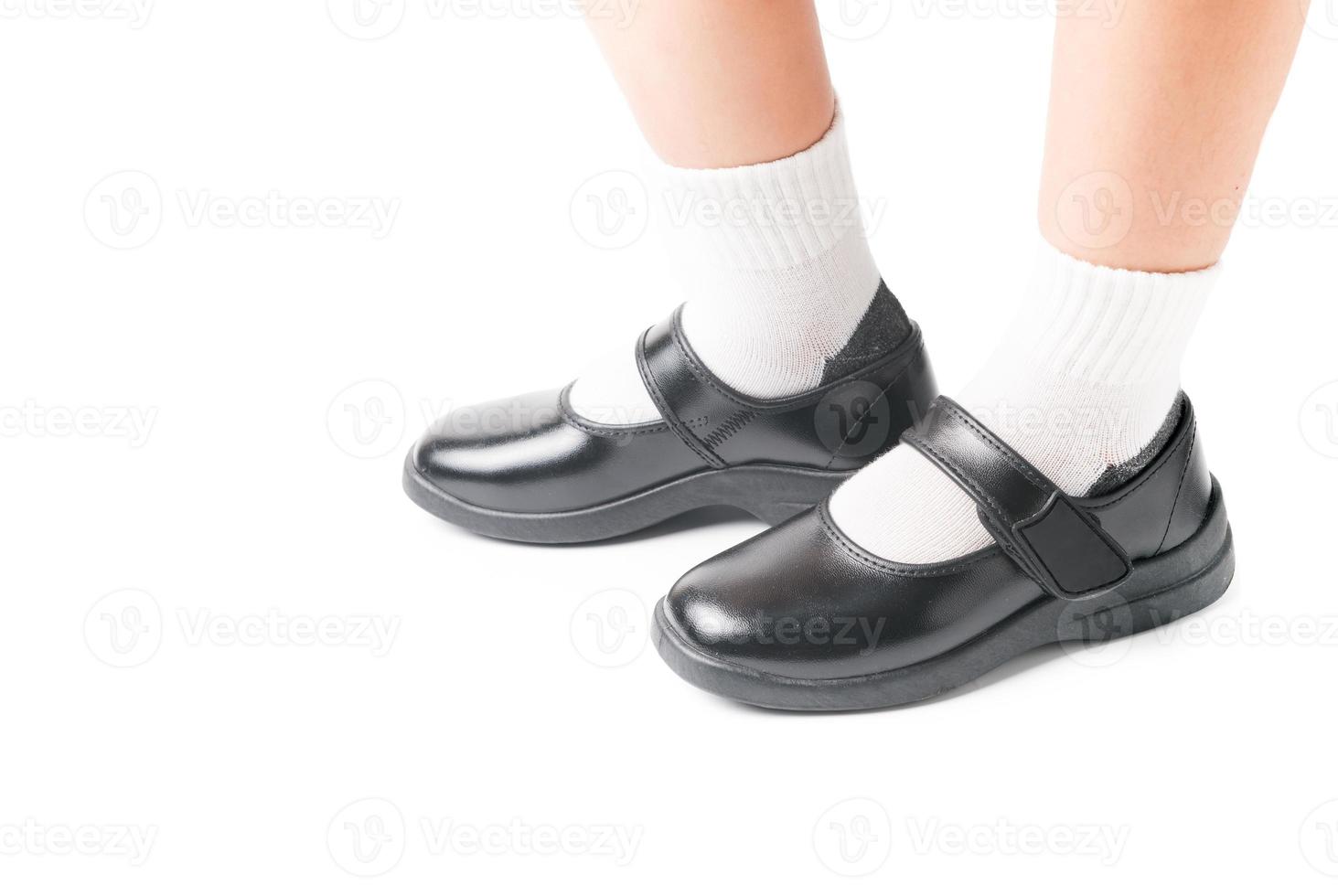 Asian Thai girls schoolgirl student wear a black leather shoes. photo