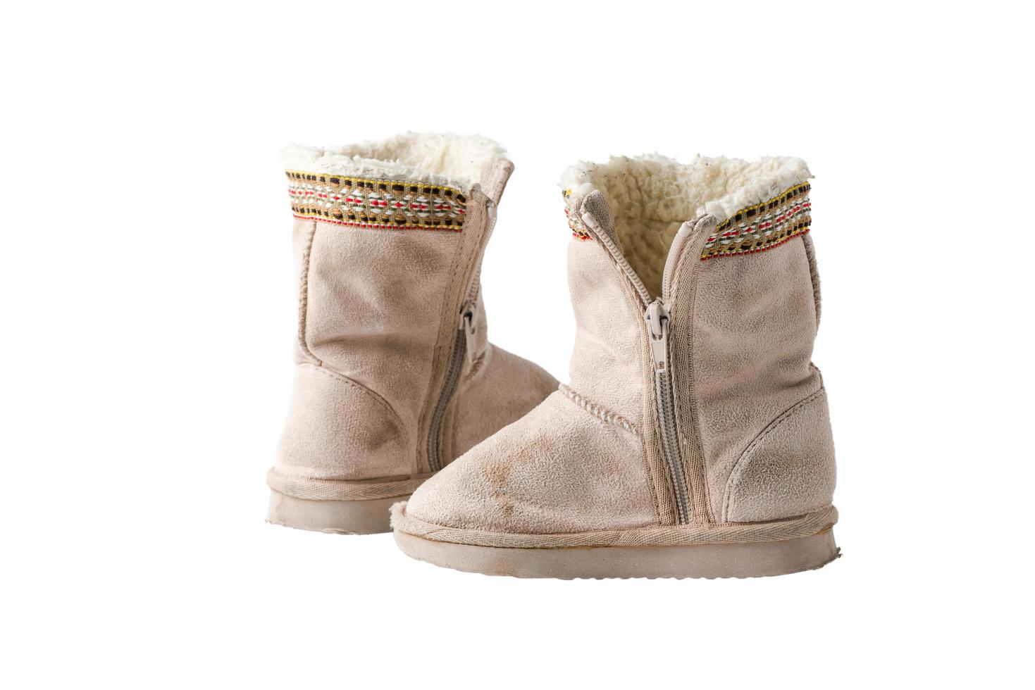 Kids warm winter boots with fur isolated photo