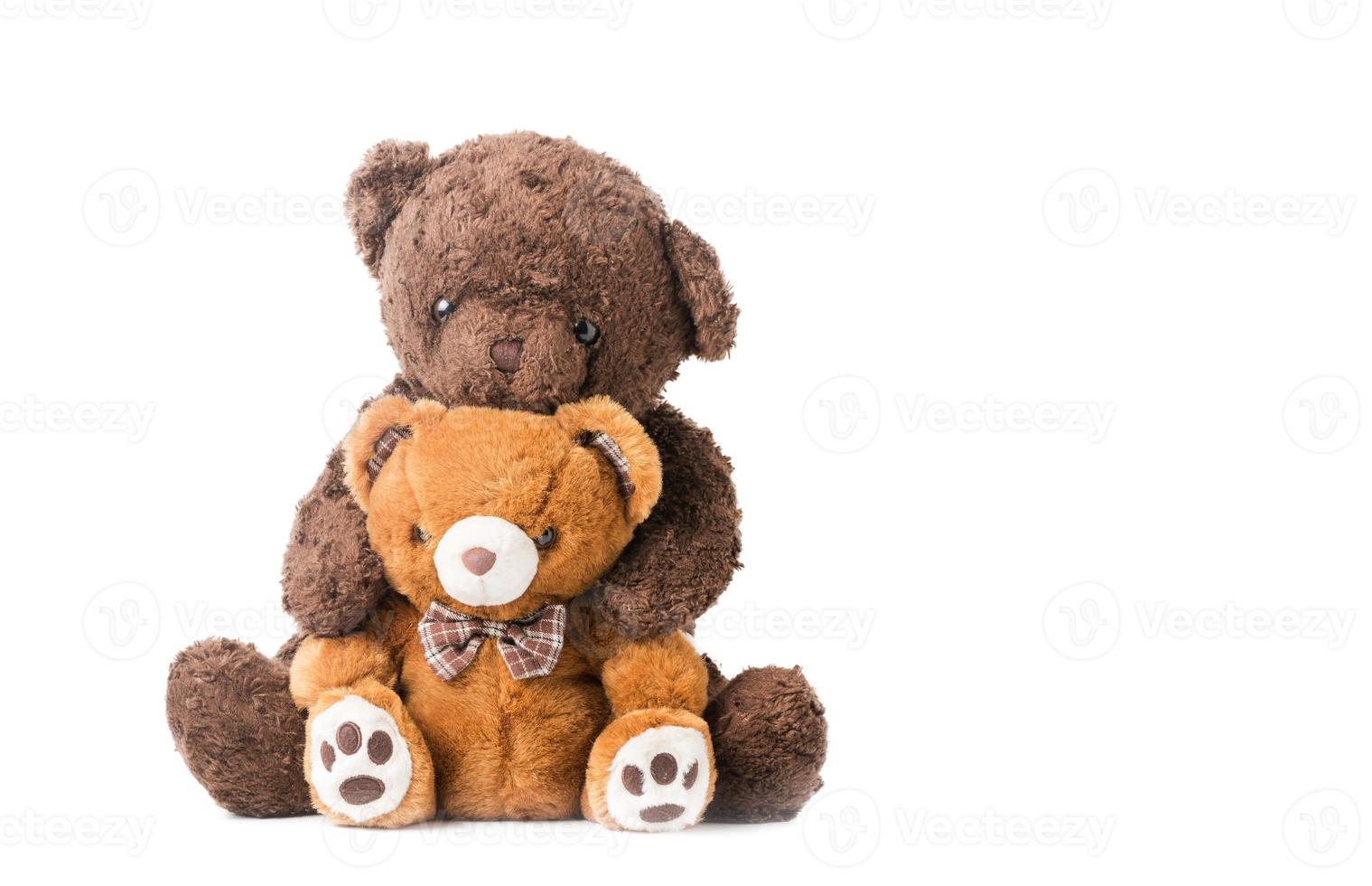 two teddy bear hugging isolated on white background photo