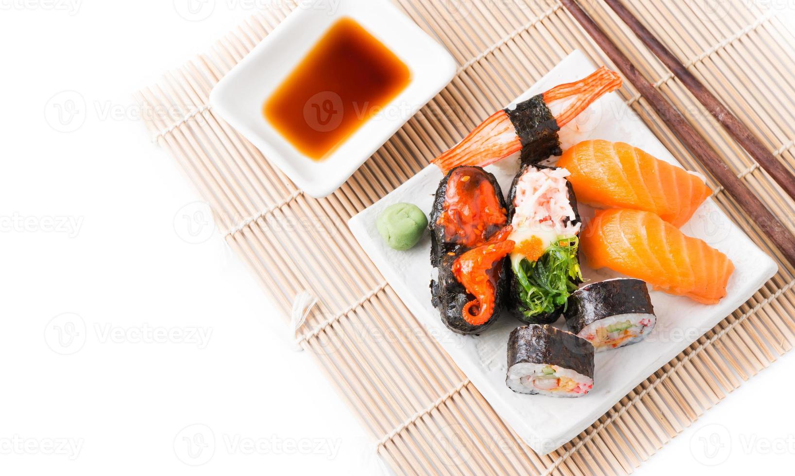 Mix Sushi on white dish isolated photo