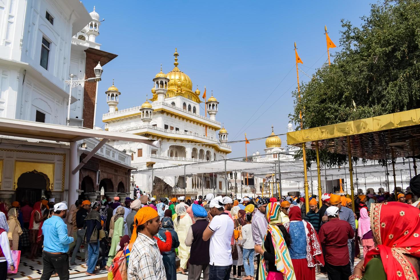 Amritsar, India - February 26 2023 - Unidentified devotees from various parts at Golden Temple - Harmandir Sahib in Amritsar, Punjab, India, Famous indian sikh landmark, Golden Temple photo