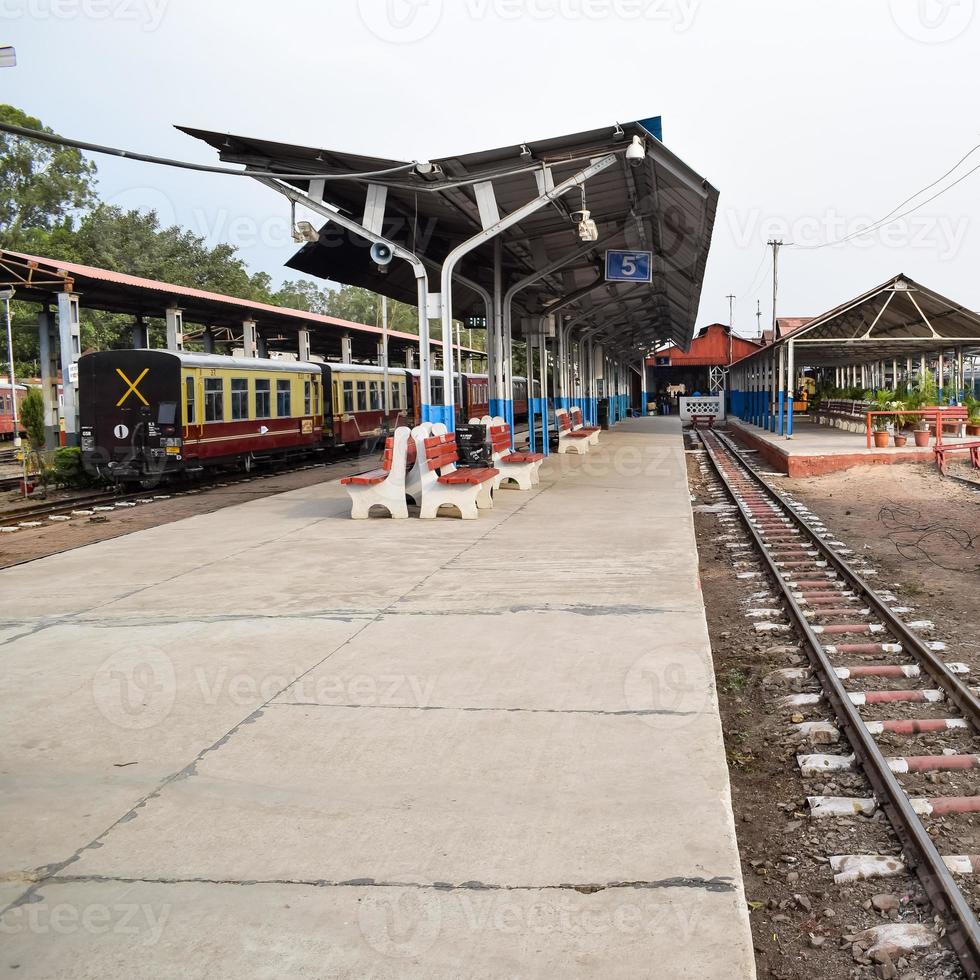 View of Toy train Railway Tracks from the middle during daytime near Kalka railway station in India, Toy train track view, Indian Railway junction, Heavy industry photo