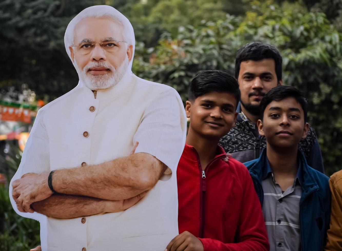 New Delhi, India - January 16 2023 - Prime Minister Narendra Modi cut out during BJP road show, the statue of PM Modi while attending a big election rally in the capital photo