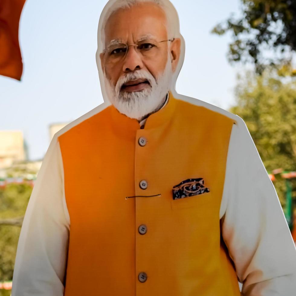 New Delhi, India - January 16 2023 - Prime Minister Narendra Modi cut out during BJP road show, the statue of PM Modi while attending a big election rally in the capital photo
