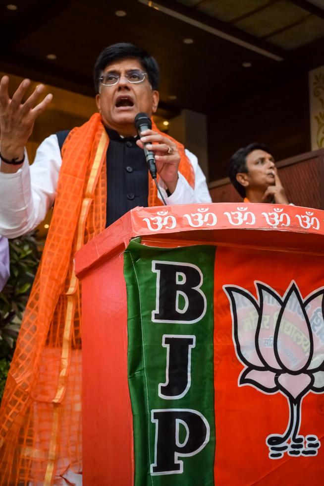New Delhi, India - November 27 2022 - Piyush Goyal Cabinet Minister and core member of Bharatiya Janata Party BJP during a rally in support of BJP candidate ahead of MCD local body Elections 2022 photo