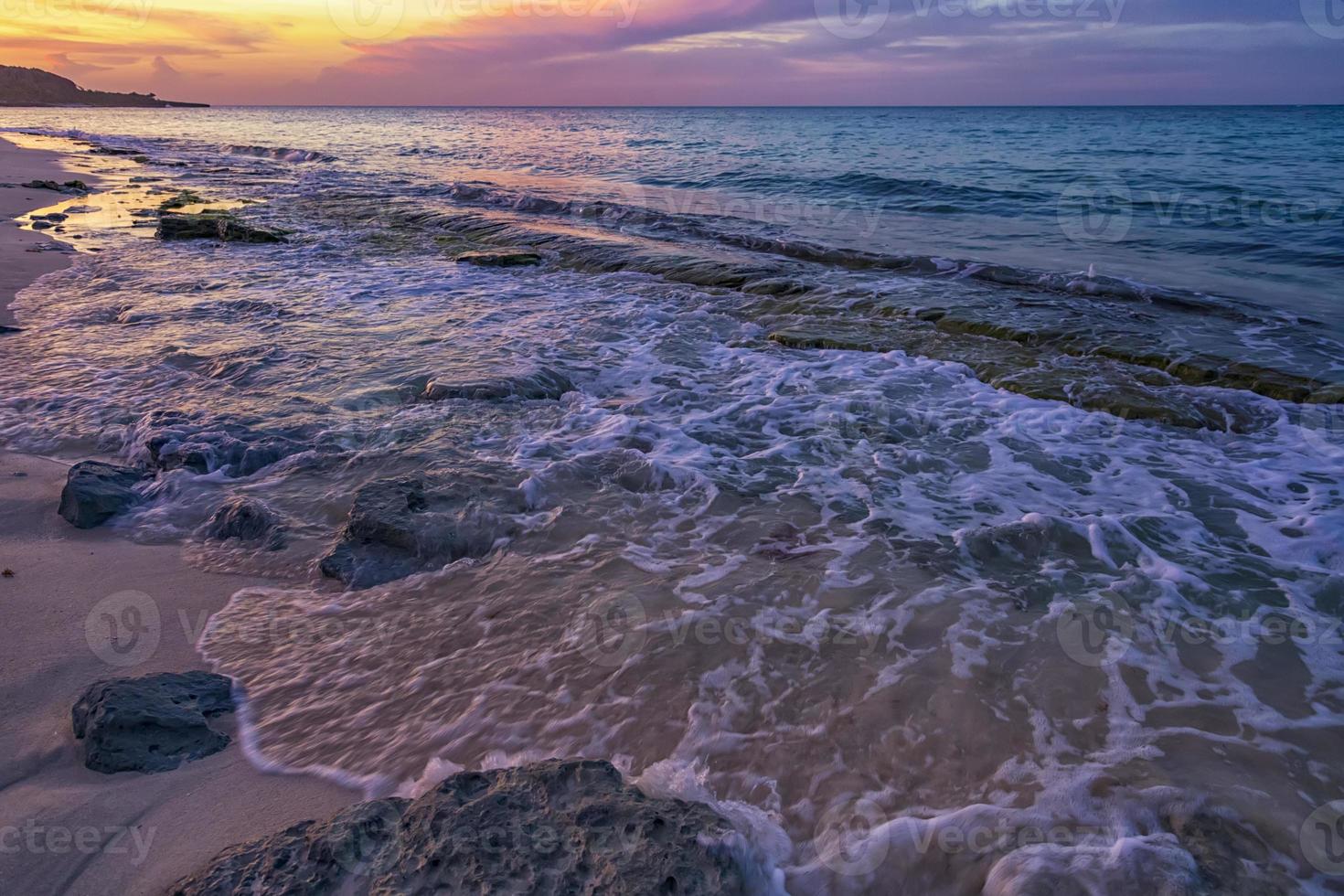 An incredible feeling at the shore of the Atlantic ocean in anticipation of sunset, Cuba photo