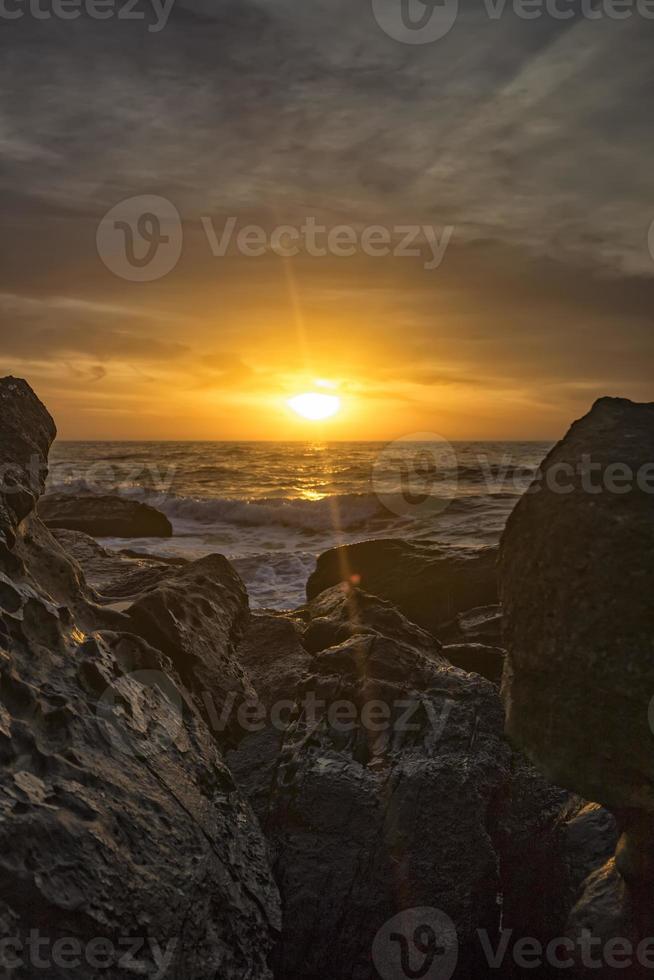 Sea sunrise among the rocks. Sea sunrise at the Black Sea coast near Varna, Bulgaria photo