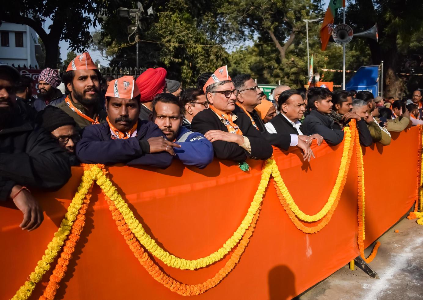 New Delhi, India - January 16 2023 - Thousands of people collected during Prime Minister Narendra Modi BJP road show, people during PM Modi big election rally in the capital photo