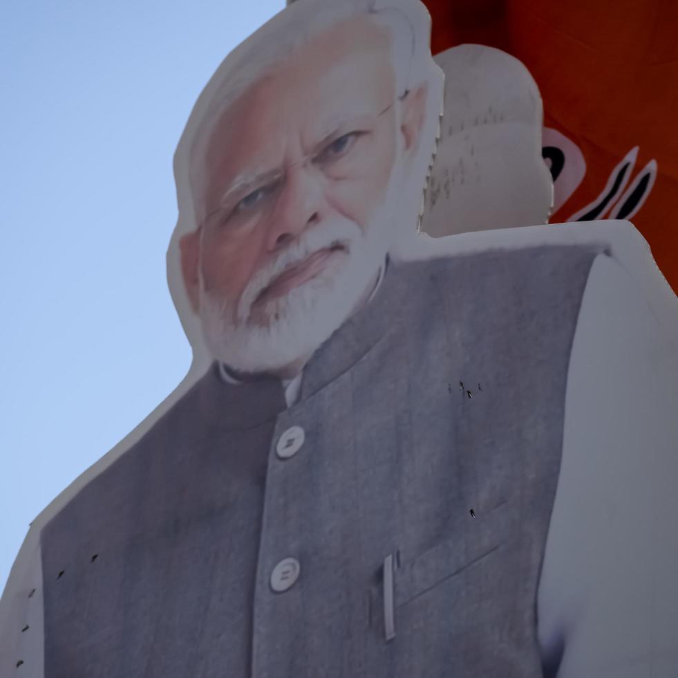 New Delhi, India - January 16 2023 - Prime Minister Narendra Modi cut out during BJP road show, the statue of PM Modi while attending a big election rally in the capital photo