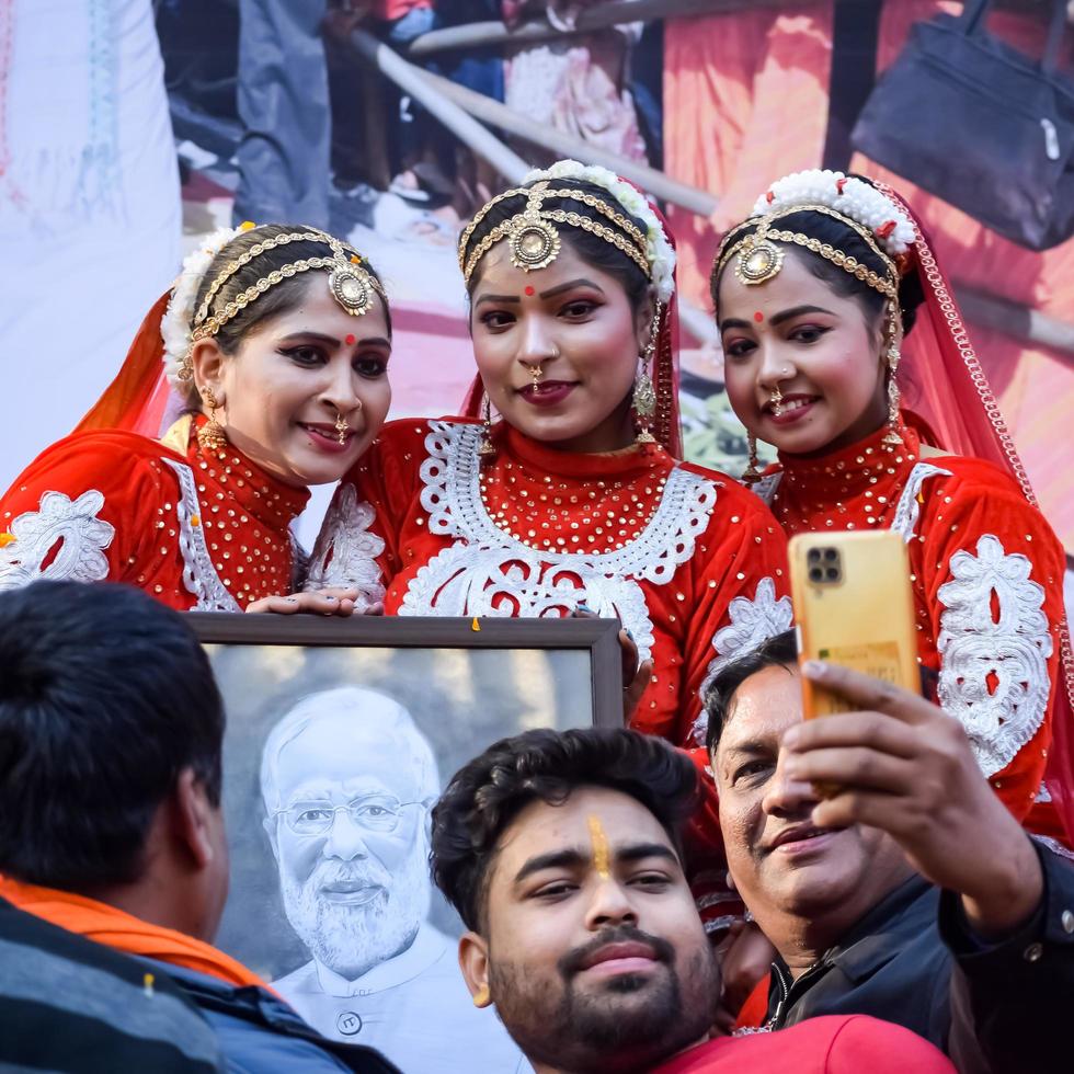 New Delhi, India - January 16 2023 - Thousands of people collected during Prime Minister Narendra Modi BJP road show, people during PM Modi big election rally in the capital photo