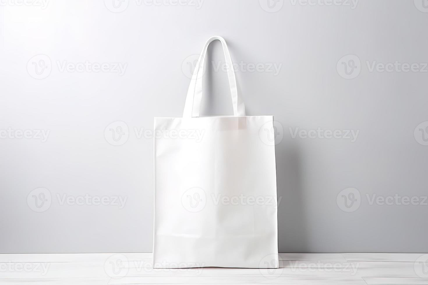 Blank canvas tote bag mockup in white eco friendly design with copy space. Concepts for zero waste movement of shopping bags photo