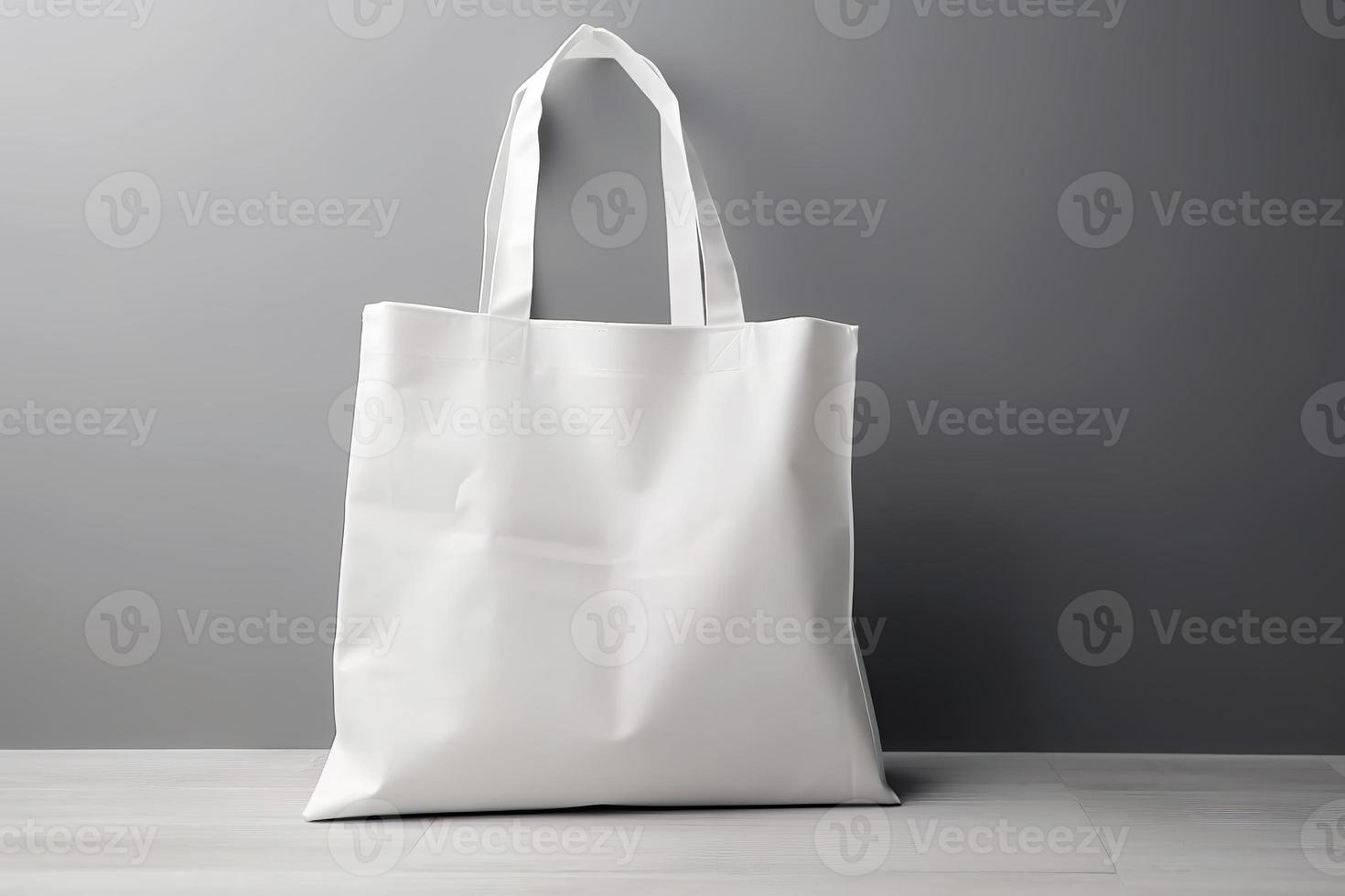 Blank canvas tote bag mockup in white eco friendly design with copy space. Concepts for zero waste movement of shopping bags photo