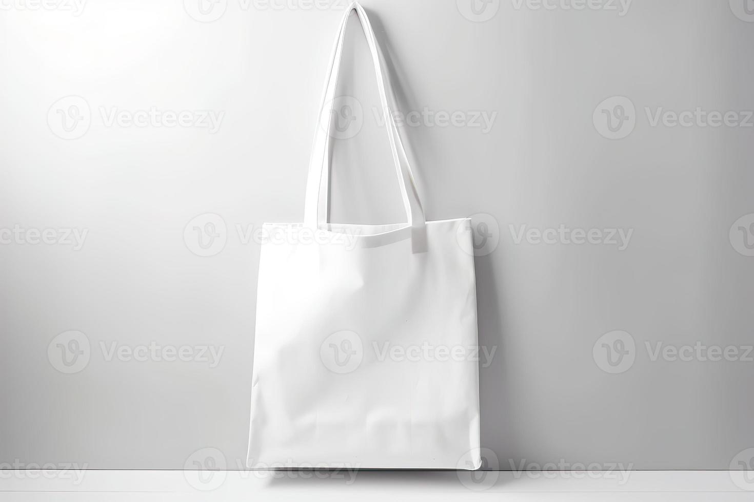 Blank canvas tote bag mockup in white eco friendly design with copy space. Concepts for zero waste movement of shopping bags photo