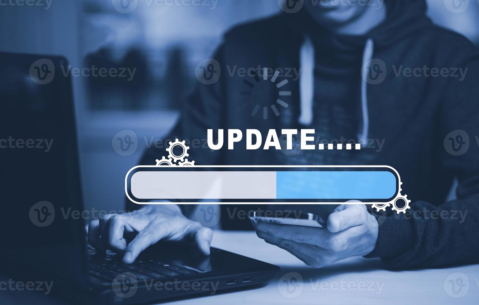 Hand touch bar of Update Software Computer Program Upgrade Business Technology Internet, Update on virtual screen. Internet and technology concept, loading bar with installing the update. photo