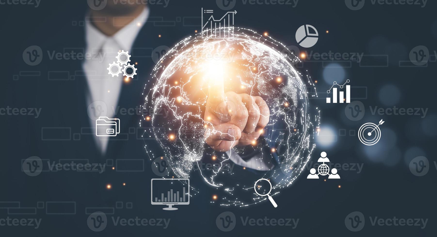Metaverse with business concept, man using computer and touch virtual globe with financial icons future technology, business goals, online communication,graph Screen Icon of a media screen,big data photo