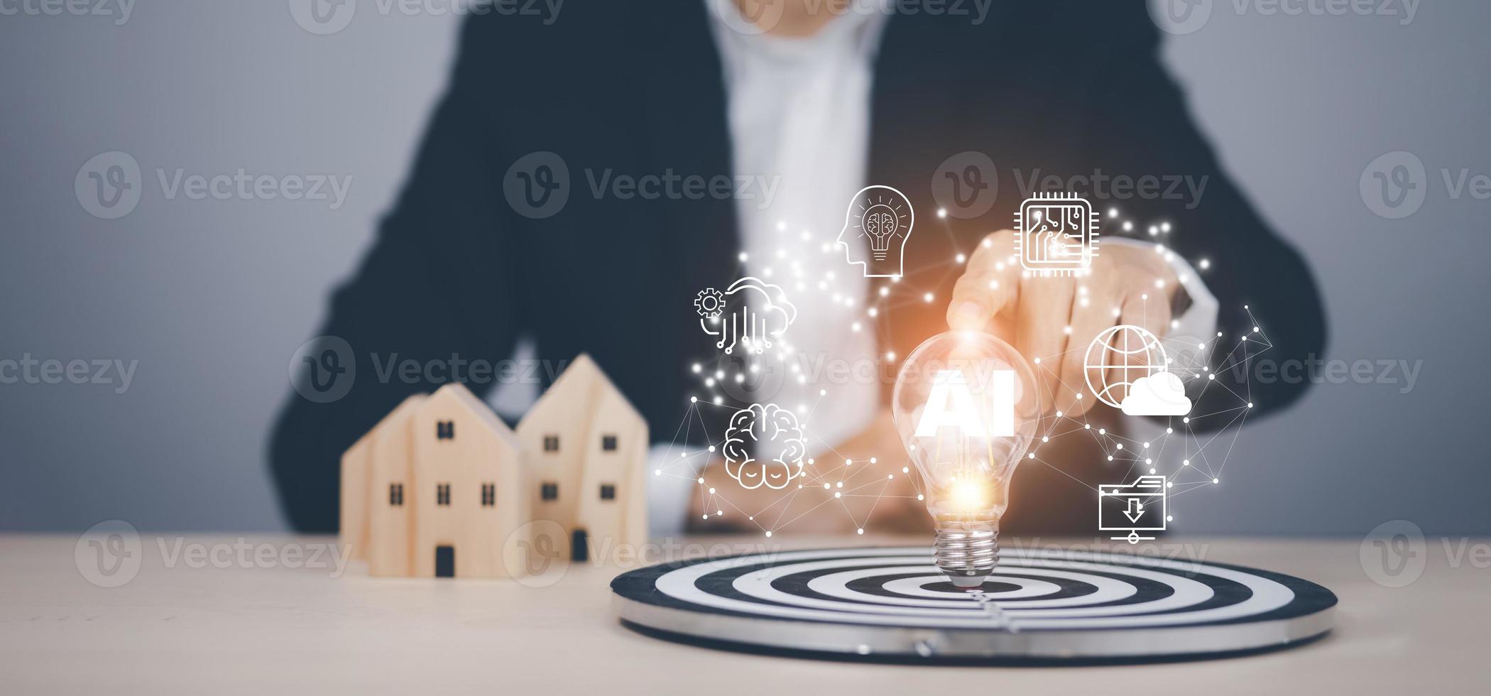 Creativity and innovation, businessman hand hold light bulb with wooden home on the desk, Creativity and innovation are keys success. Concept of new idea and innovation with icons and light bulbs, photo