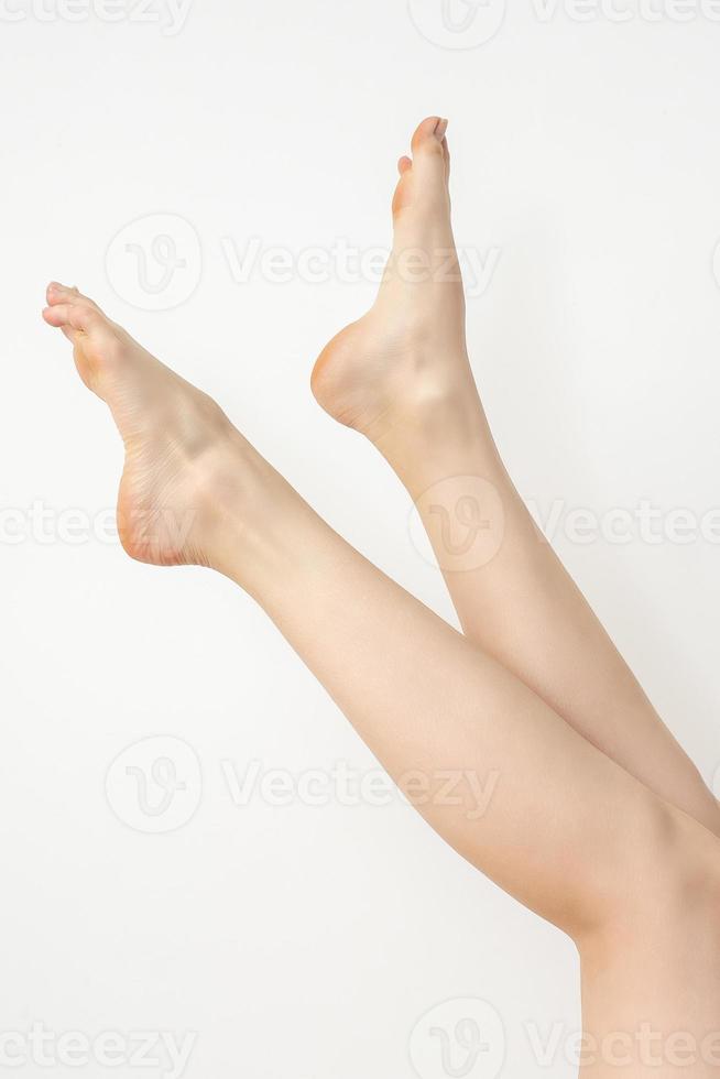 Beautiful long slender white legs photo