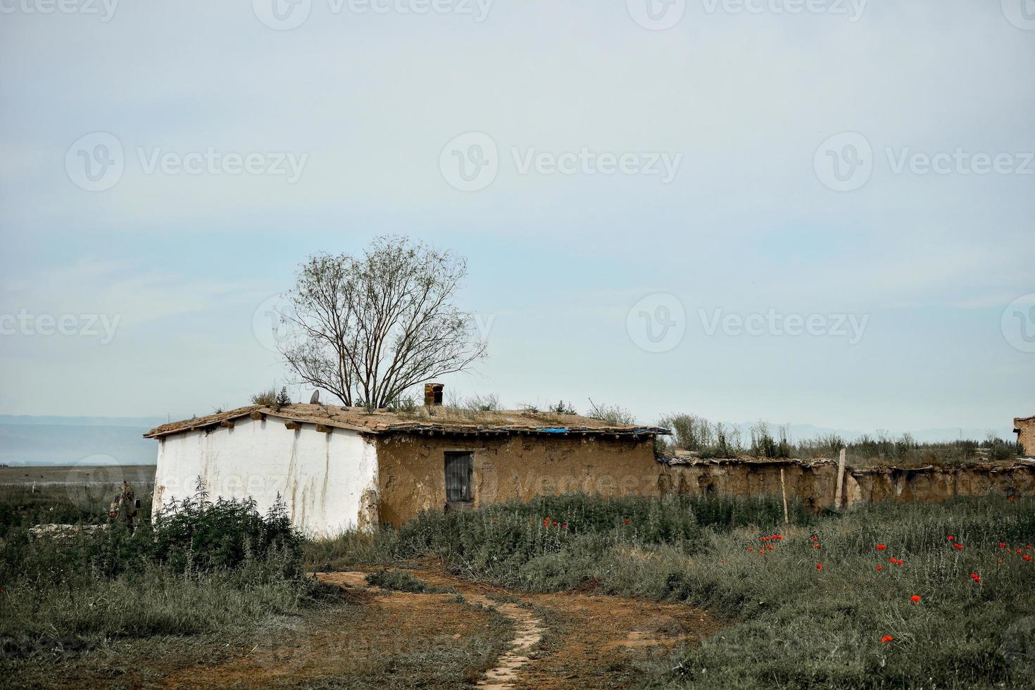 Abandoned nomads adobe farmhouse photo