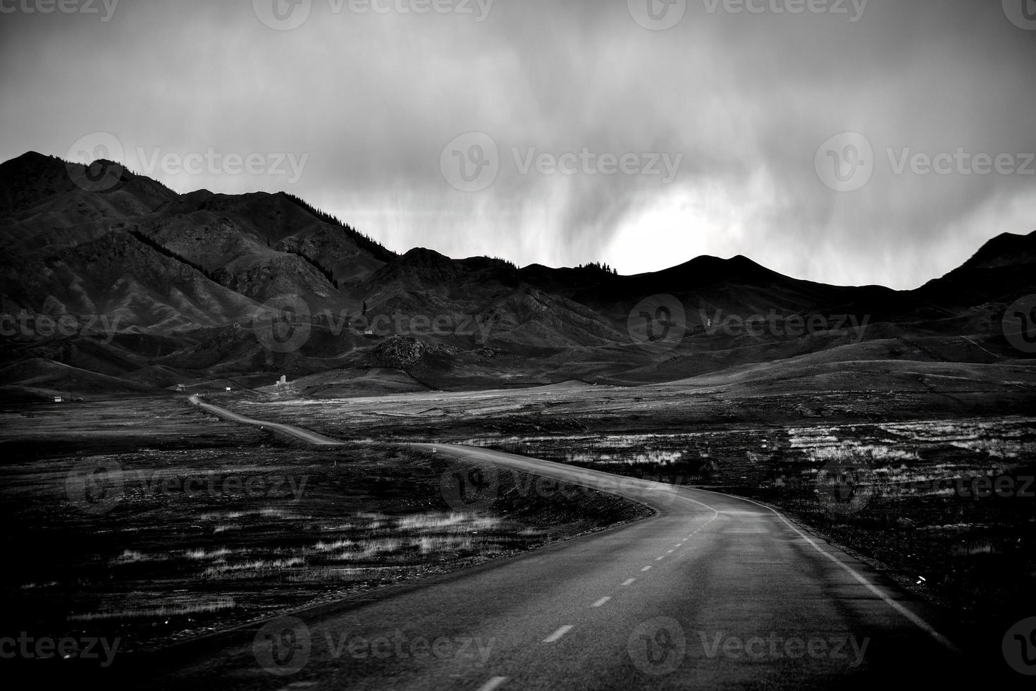 The winding mountain roads around Sailimu Lake are beautiful photo