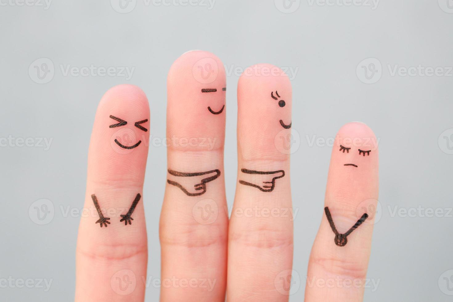 Fingers art of people. Concept children bullying their classmate. photo