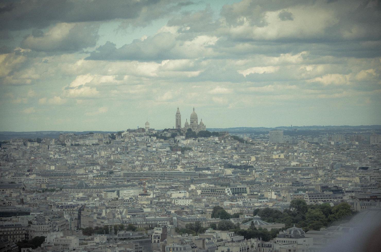 bird's eye view of the city of Paris, capital of France, during a hot summer day in August 2012 photo