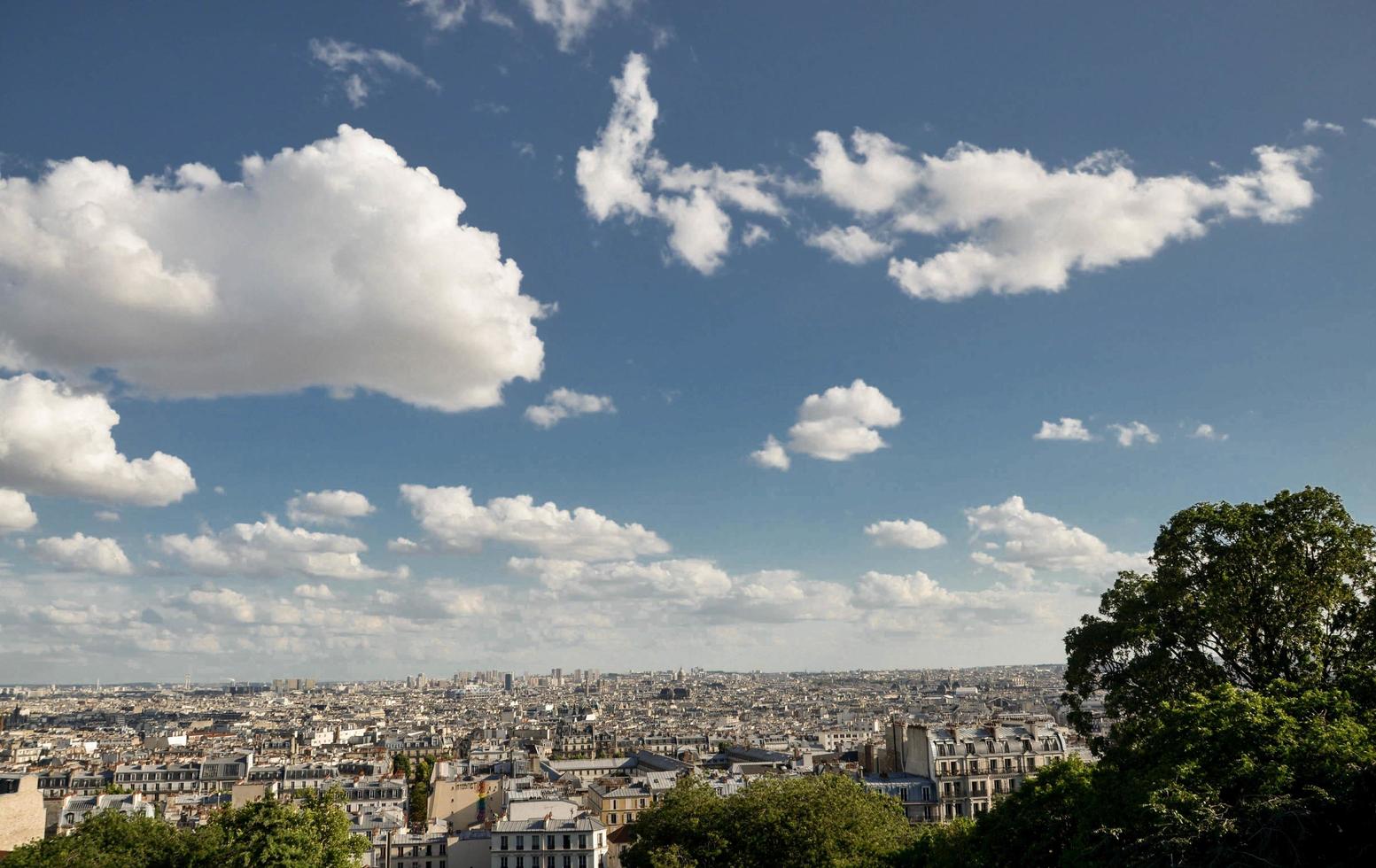 bird's eye view of the city of Paris, capital of France, during a hot summer day in August 2012 photo