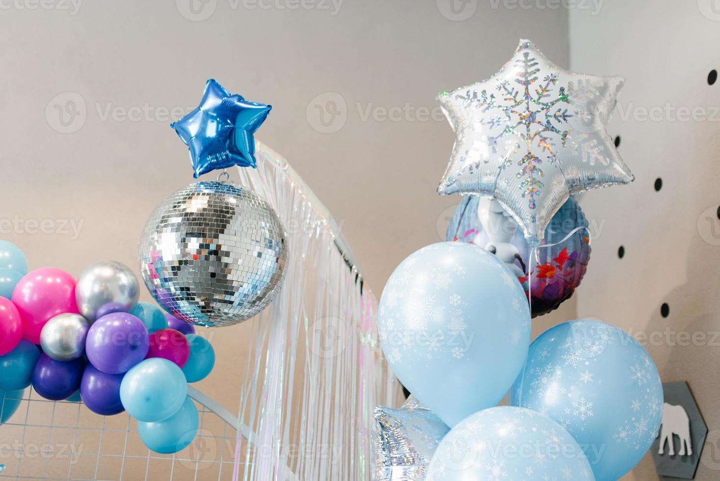 Blue and silver balloons in the children's birthday photo zone. Holiday Decor