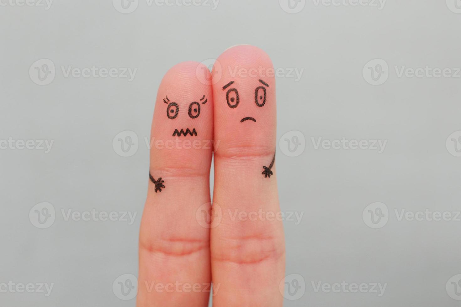 Fingers art of scared couple. Concept of a man and a woman are afraid. photo