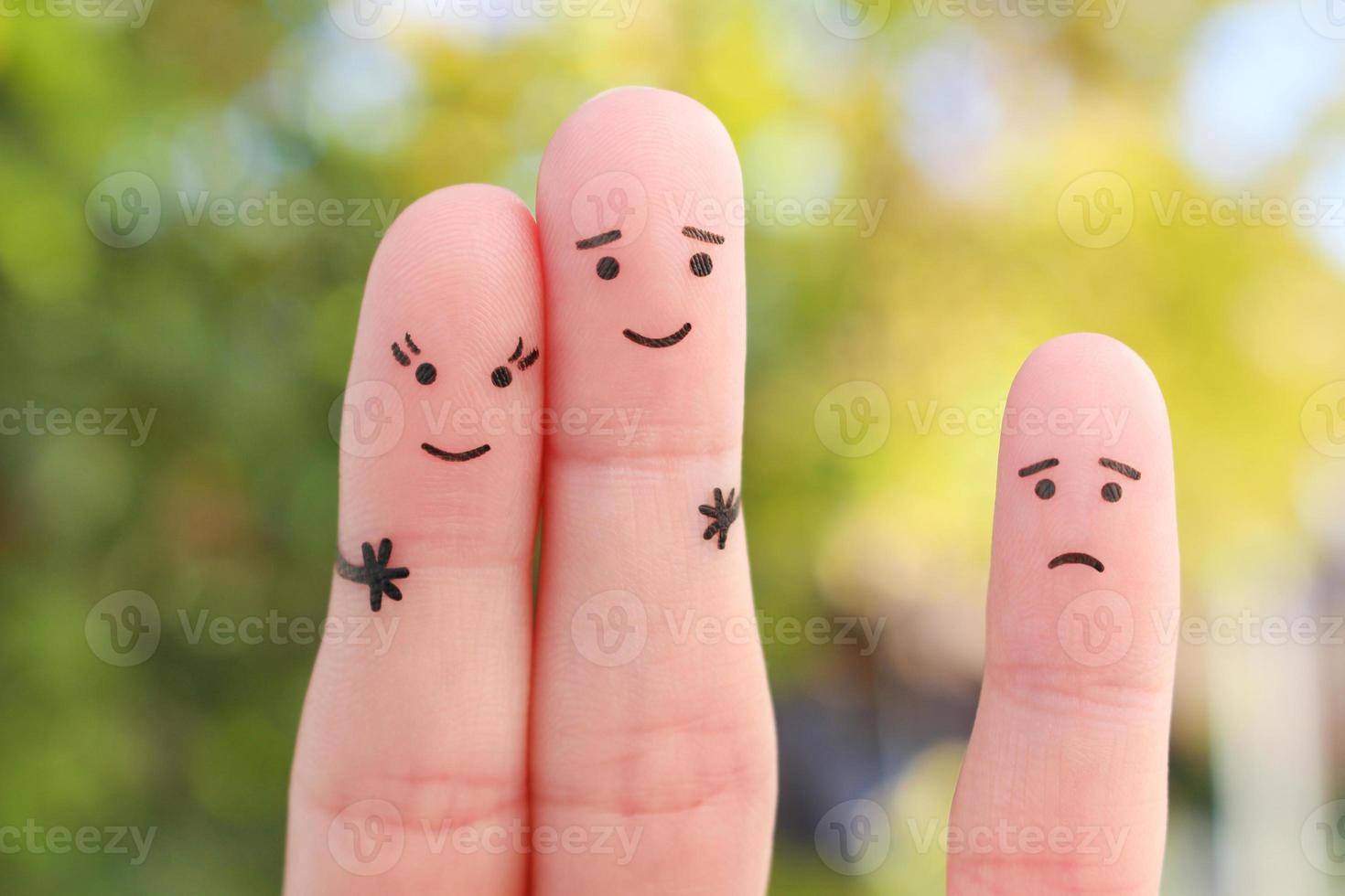 Fingers art of happy couple. Man kisses woman on cheek. Child is angry. photo