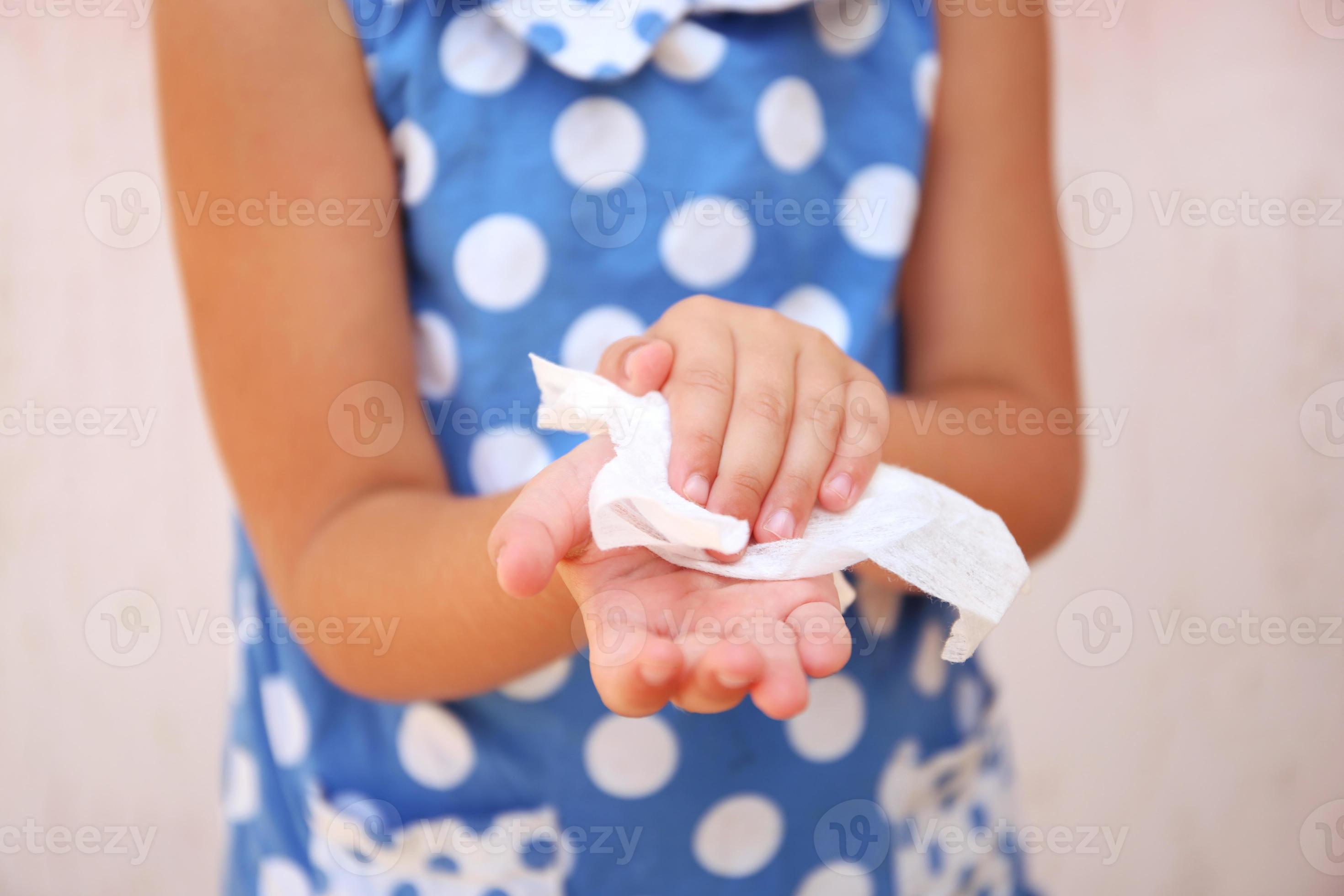 Child wipes his hands with damp cloth. 21481406 Stock Photo at Vecteezy